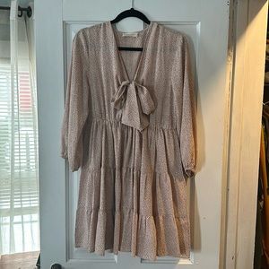 NWOT never worn! Color shows a bit more muted, but it is a very light dusty pink